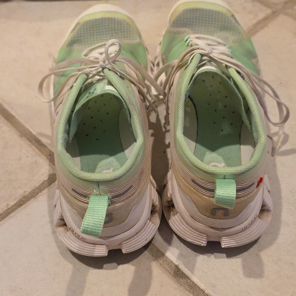 On Running Mint and White Athletic Shoes